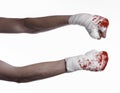 Shook his bloody hand in a bandage, bloody bandage, fight club, street fight, bloody theme, white background, isolated