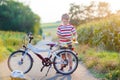 Shool kid boy having fun with riding of bicycle Royalty Free Stock Photo