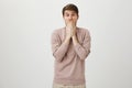 Shoot, I forgot to call you back. Portrait of disappointed handsome guy in casual shirt holding palm on head and looking Royalty Free Stock Photo