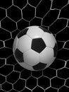 Shoot soccer ball in goal, net on black isolated background Royalty Free Stock Photo