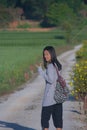 Shoot woman portrait in rice field.