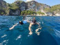 Shoot of a young boy snorkeling with father Royalty Free Stock Photo