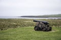 Shooting cannon Orkney coastline cliff landscape Royalty Free Stock Photo
