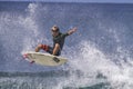 Shooting the curl at Honolua Bay on Maui.