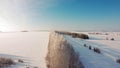 Shooting from a drone in winter forests and fields