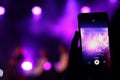 Shooting festival concert on smartphone Royalty Free Stock Photo