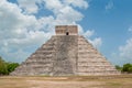 Shooting of the Mayan Pyramid of Kukulkan, with visible the restored side and the original side Royalty Free Stock Photo