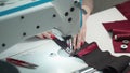 Shooting of tailor sewing order on electric machine