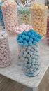 Shop display vase full of bath bombs sweet pastel colous