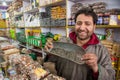 Shop keeper in Kashmir, India shows local green tea known as Kahwah Royalty Free Stock Photo