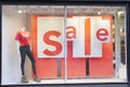 Shop Mall Sale Sign on Window with Female Mannequin Royalty Free Stock Photo