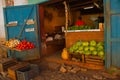 Shop, market with vegetables: cabbage, tomatoes. pumpkin, pepper, garlic. Trinidad, Cuba.