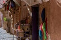 Shop in Marrakech with wooden doors and nail heads of Mozarabic style umbrellas in Morocco