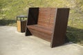 Shop in park. Wooden bench on steel frame. Park furniture Royalty Free Stock Photo