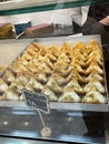 A shop selling oriental sweets is displayed in the exhibition, and there is a worker selling sweets