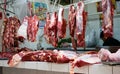 Shop and stall of a butcher in Huaraz selling fesh meat in the market hall in Huaraz Royalty Free Stock Photo