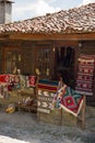 Shop traditional homespun rugs in the Bulgarian village of Zheravna Royalty Free Stock Photo