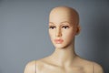 shop window mannequin or display dummy with bald head and naturalistic face Royalty Free Stock Photo