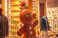 Shop window in Milan. Gingerbread classic cookie hero. Gingerbread men on display in a fashion store. BOGGI MILANO the