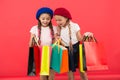 Shopaholic concept. Signs you are addicted to shopping. Kids cute schoolgirls hold bunch shopping bags. Children pupils Royalty Free Stock Photo