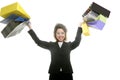 Shopaholic woman with colorful shopping bags hands