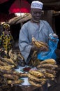 Shopkeeper selling plantain in Bamako Royalty Free Stock Photo