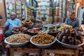 Shopkeepers at an old shop selling exotic spices in the market in Charminar in old Hyderabad