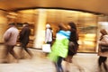 Shopper walking in front of shop window