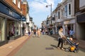 Shopper walking through the high street of Ryde on the Isle of Wight