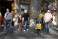 Shoppers with bags on Passeig de GrÃ¯Â¿Â½cia in the Eixample district, busy street in Barcelona, Spain, Europe