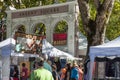 Shoppers and booths under Ankeny Arches Portland Oregon