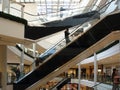 Shoppers on elevators Royalty Free Stock Photo