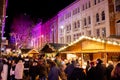 Shoppers enjoy the food and drink huts at the German Christmas market in Birmingham