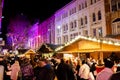 Shoppers enjoy the food and drink huts at the German Christmas market in Birmingham