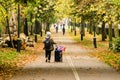 Shoppers hold hands on busy London high street