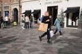 Shoppers pass Geor Jensen store in Copenhagen Denmark