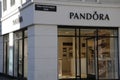 SHOPPERS PASS BY PANDORA STORE