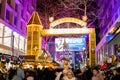 Shoppers pass under the main German Christmas market entrance in Birmingham