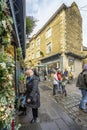 Shoppers and stalls on Catherine Hill at Frome Christmas Sunday Market in Frome, Somerset, UK Royalty Free Stock Photo