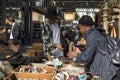 Shoppers view old vintage jewelry at Spitalfields Market