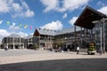 Shoppers walk through the modern Arc shopping center in Bury St Edmunds, UK