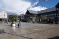 Shoppers walk through the modern Arc shopping center in Bury St Edmunds, UK