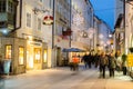 Shoppers Walking along the Historic Liznzergasse Lane in Salzburg, Austria