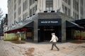 Shoppers wearing face masks outside House of Fraser flagship store, Oxford Street London Royalty Free Stock Photo