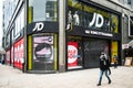 Shoppers wearing face masks outside JD sports flagship store, Oxford Street London