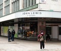 Shoppers wearing face masks outside John Lewis, Oxford Street