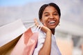 Shopping bag, black woman and smile portrait outdoor with retail bags after sale and sales promotion. Happy, customer Royalty Free Stock Photo