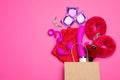 Shopping bag and different sex toys on background, flat lay. Space for text Royalty Free Stock Photo