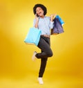 Shopping bag, excited phone call and portrait black woman with sales product, discount fashion deal or mall store Royalty Free Stock Photo