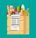 Shopping bag full of groceries and receipt Royalty Free Stock Photo